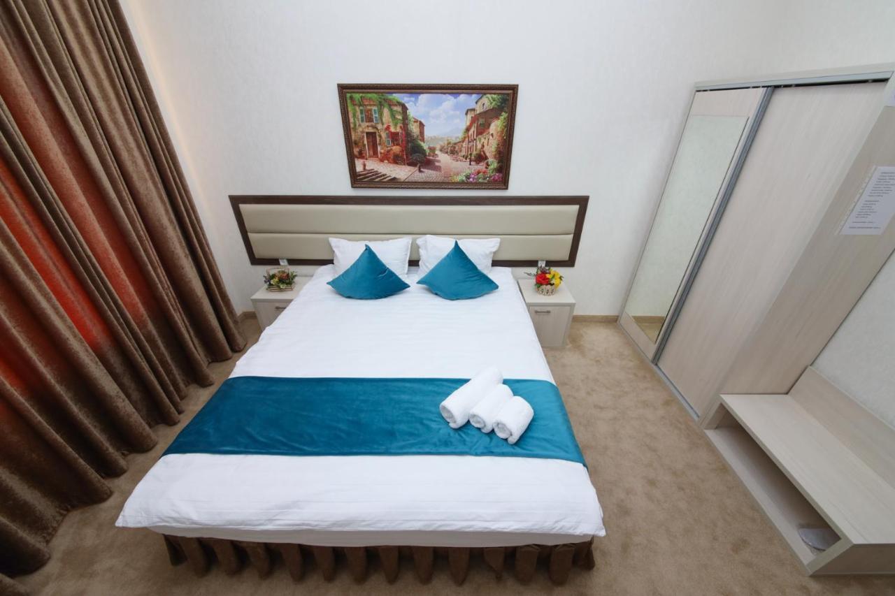 Hotel Globus Tashkent Bagian luar foto
