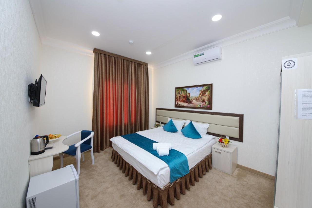 Hotel Globus Tashkent Bagian luar foto